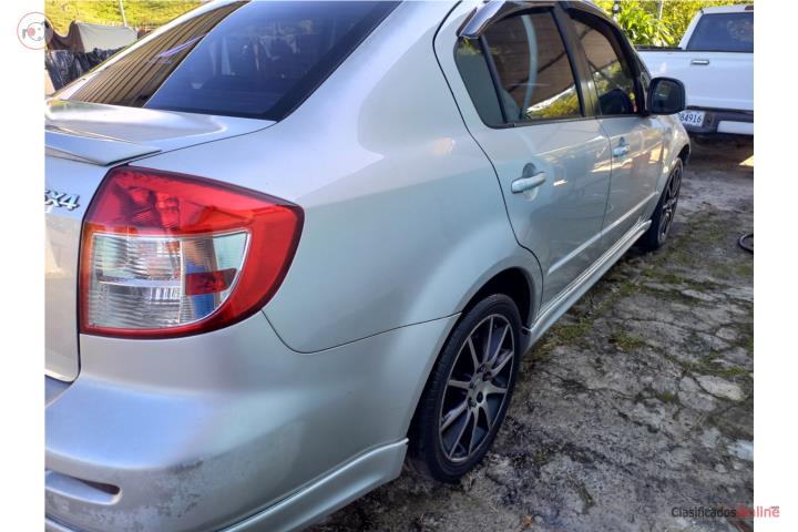 2009 Suzuki SX4 Standard with air conditioning and full labels