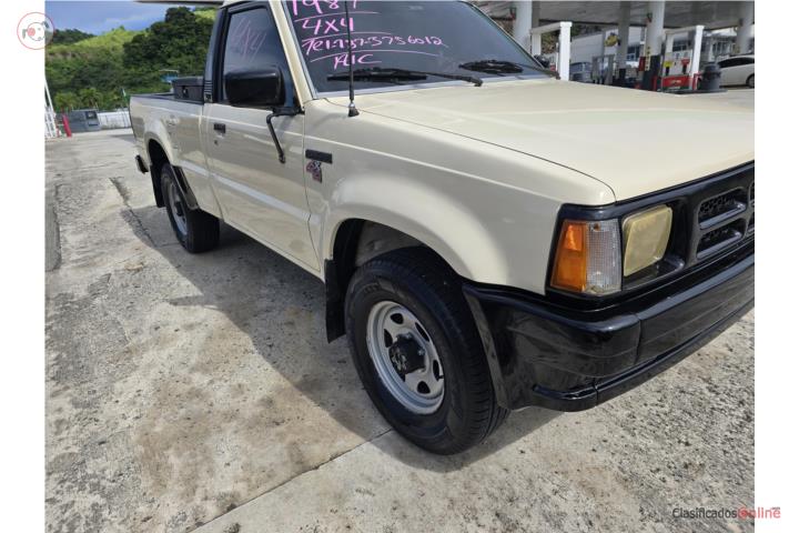Mazda B2600 canopy truck